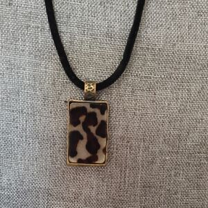 Vintage Brass Pendant With Leopard.Print Glass Stone On A Black Velvet Cord.